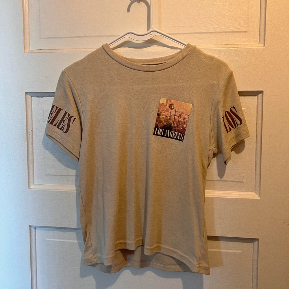 Good Karma, size medium shirt, cooor tan with sunset accents 😊